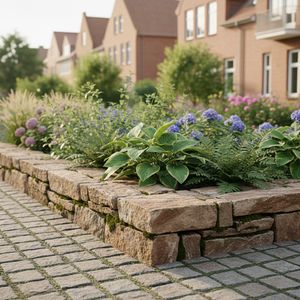 Hochwertige Natursteinmauer und Pflasterung